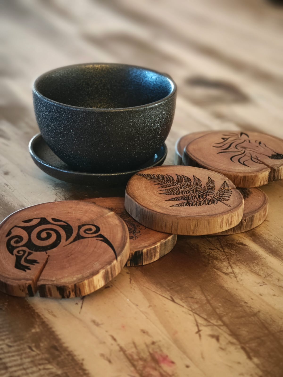 Hand-turned timber coasters, the craft at tabletop scale, finished with natural oils