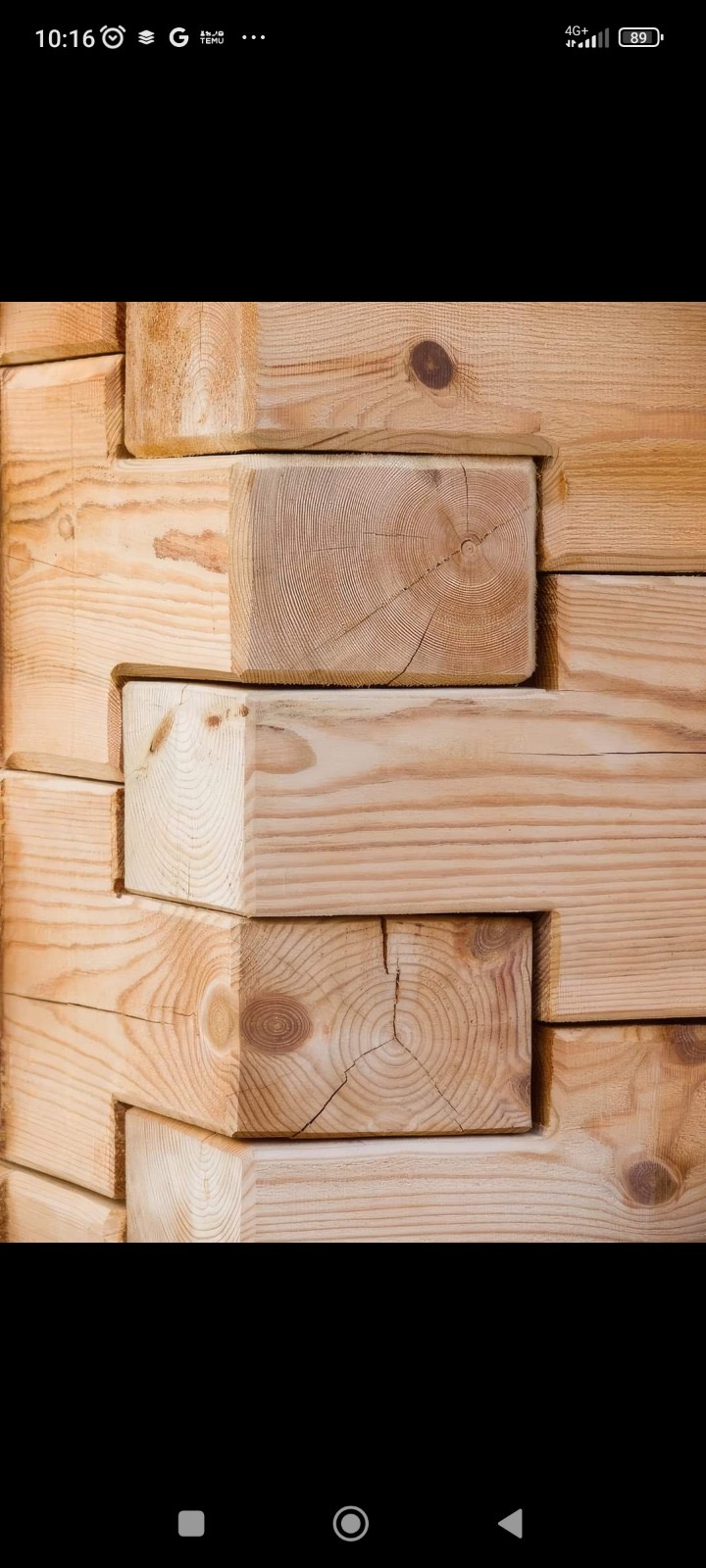 Hand-scribed dovetail timber joint detail